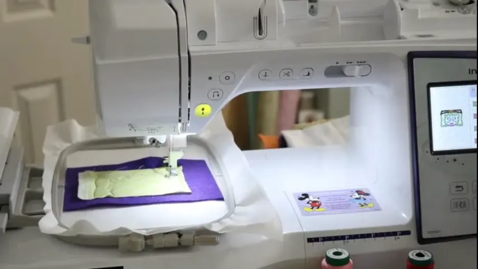The picture is showing how to add hair fabric in Brother Embroidery Machine Tutorial 